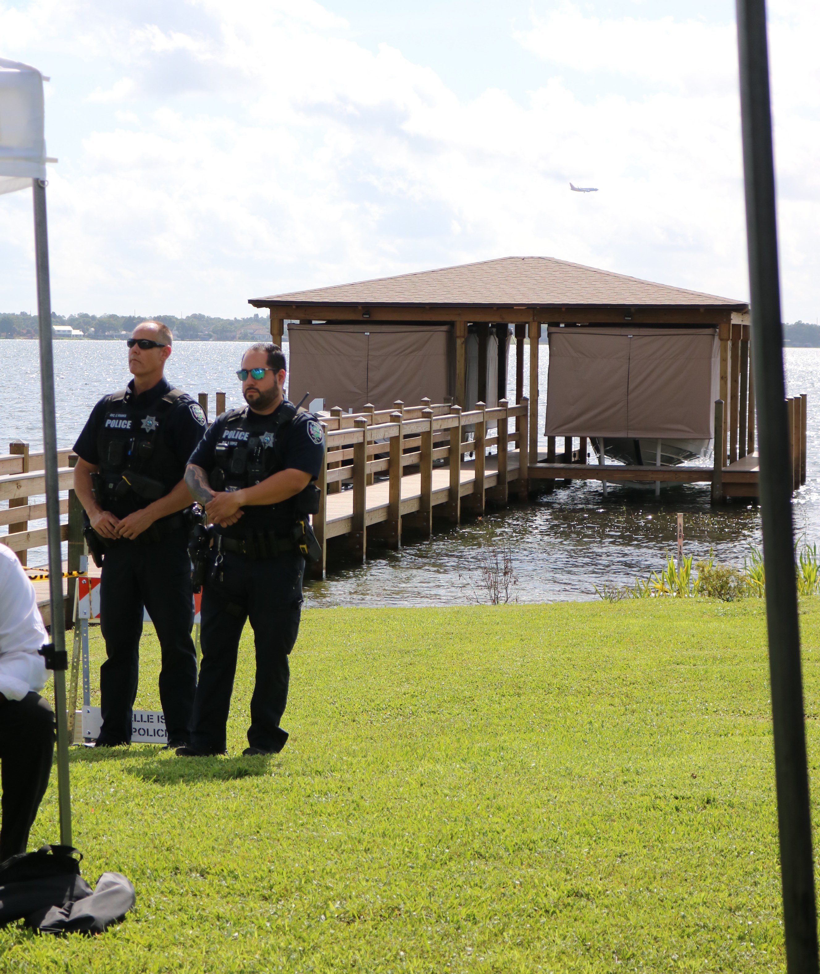 Lake Conway police patrol boat with automated Touchless Cover® system retracting for immediate emergency deployment