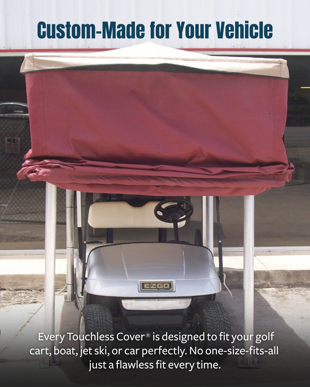 Boat docked beneath a custom maroon-and-beige Touchless Cover® canopy, highlighting tailored protection and roll-up design.