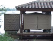 Beige Touchless Pontoon Boat Covers side by side, one open and one closed
