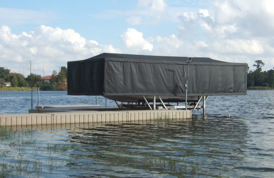 Ski boat under automatic boat cover