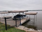 Boat dock with ski boat and Touchless Automatic Cover, ready for use.